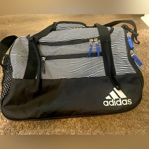 Small black and white striped gym bag